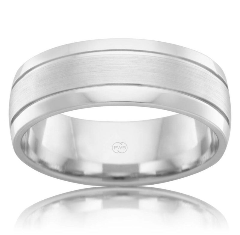 Gold River Jewellers Mens wedding band in White Gold featuring a brushed finish center strip. This unique elements adds a subtle yet distinct style.