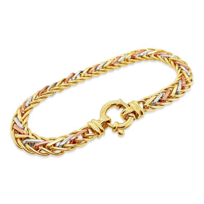 The bracelet is made using solid 9ct Yellow, White and Rose Gold with a bolt ring .