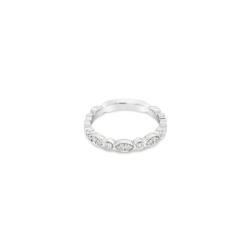 diamond set stackable ring can be worn against other rings or on its own. This stunning piece features a total diamond weight of .25ct in round brilliant diamonds in grain settings.
