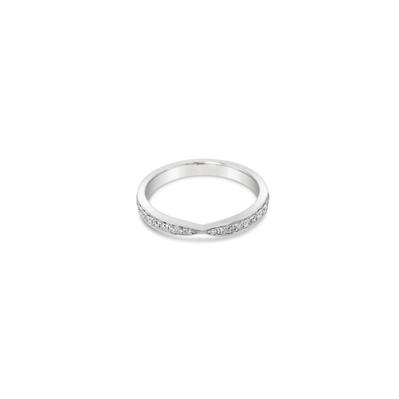 Crafted of 9k white gold, this wedding band features a brushed finish center strip. This unique elements adds a subtle yet distinct style.
