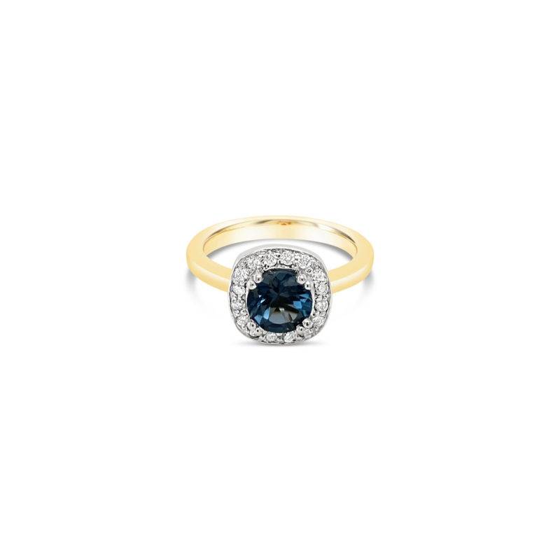 London Blue Round Topaz featuring a Diamond Set Halo, crafted in 18ct Yellow Gold.  Metal: 18ct Yellow Gold  TDW: 0.16ct