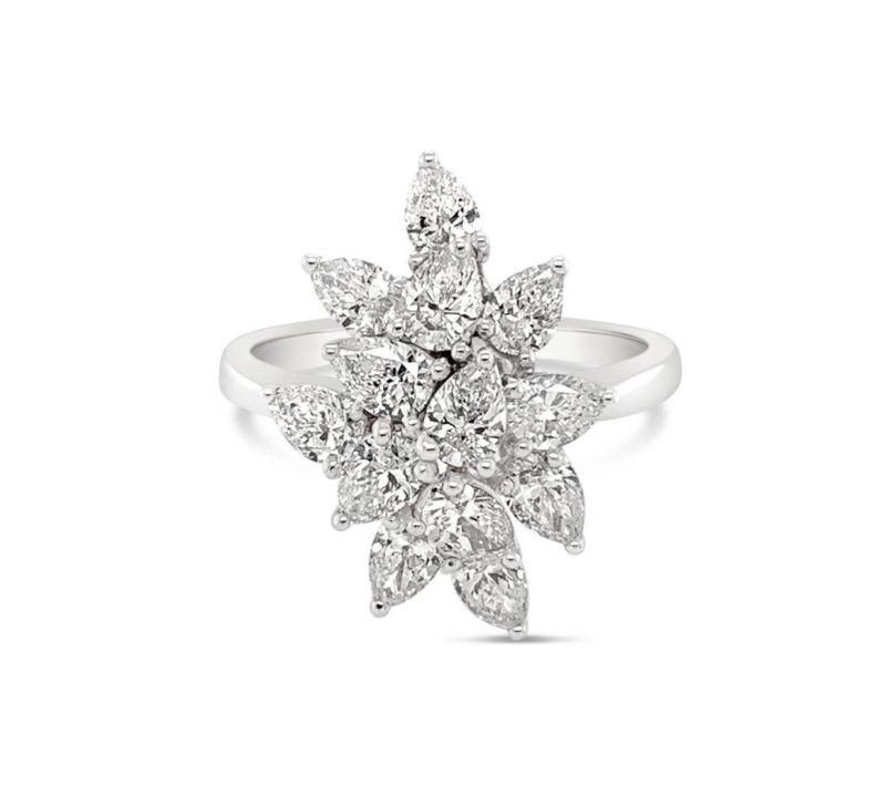 This Pear Cluster Ring compromises of 13 individual pear shaped diamonds, making it an amazing statement ring. This ring was crafted in 18ct White Gold making in a perfect piece for any special occasion.