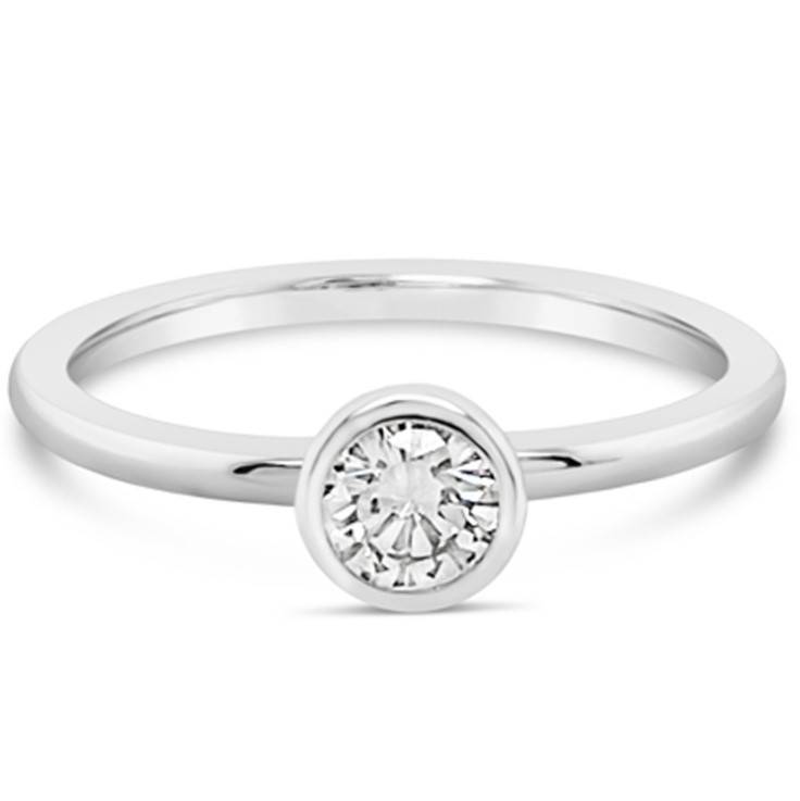 Petite Bezel Diamond Ring, meaningful 9ct white gold ring. Simply adorned with a round diamond with a bezel setting