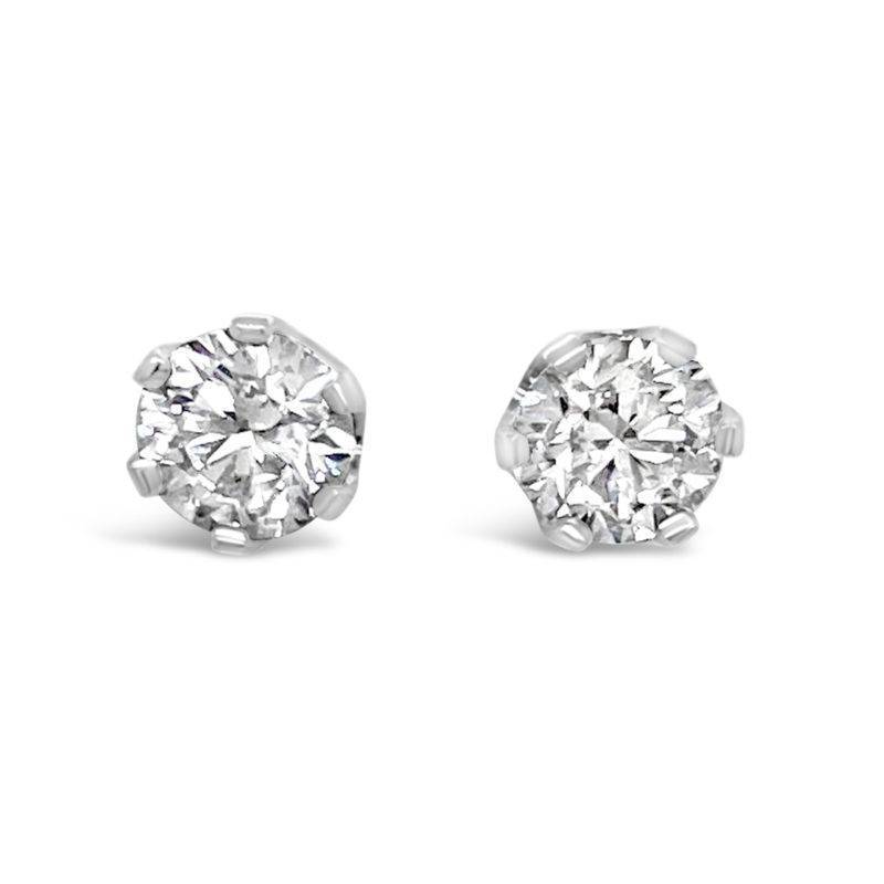 These earrings featuring 2 beautiful round brilliant diamonds crafted in a platinum setting, a total diamond weight of 1.42ct. 